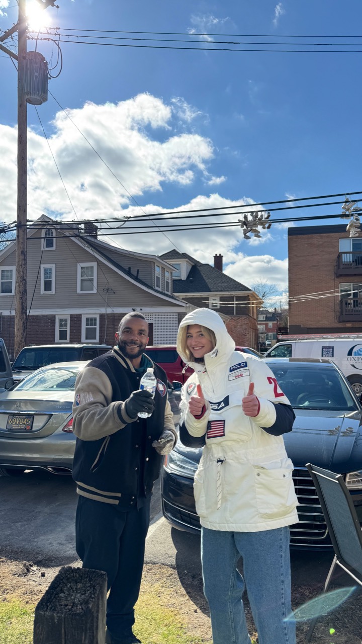 Mechanic and customer giving a thumbs up after the job